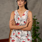 White and orange Kalamkari printed dress with elegant pintuck detailing