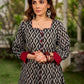 Elegant black grey mercerised Ikat shirt dress featuring a soft square neck, subtle maroon detailing, and a waist belt for a gently flowing silhouette.