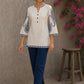 Elegant ivory hand block print top featuring intricate navy blue paisley sleeves, refined contrast detailing, and graceful pintucks, blending artisanal craftsmanship with timeless everyday sophistication.