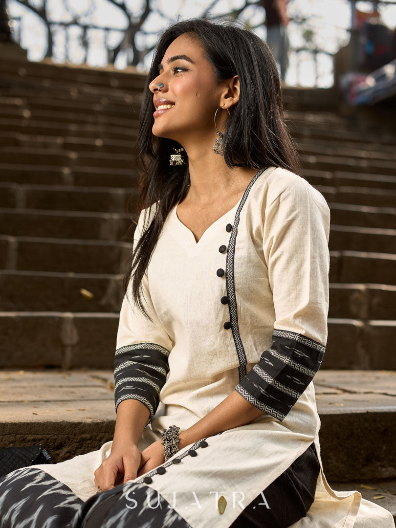 Elegant Off-White Cotton Flex Kurti with Ikat Hem & Sleeve Accents