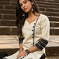 Elegant Off-White Cotton Flex Kurti with Ikat Hem & Sleeve Accents