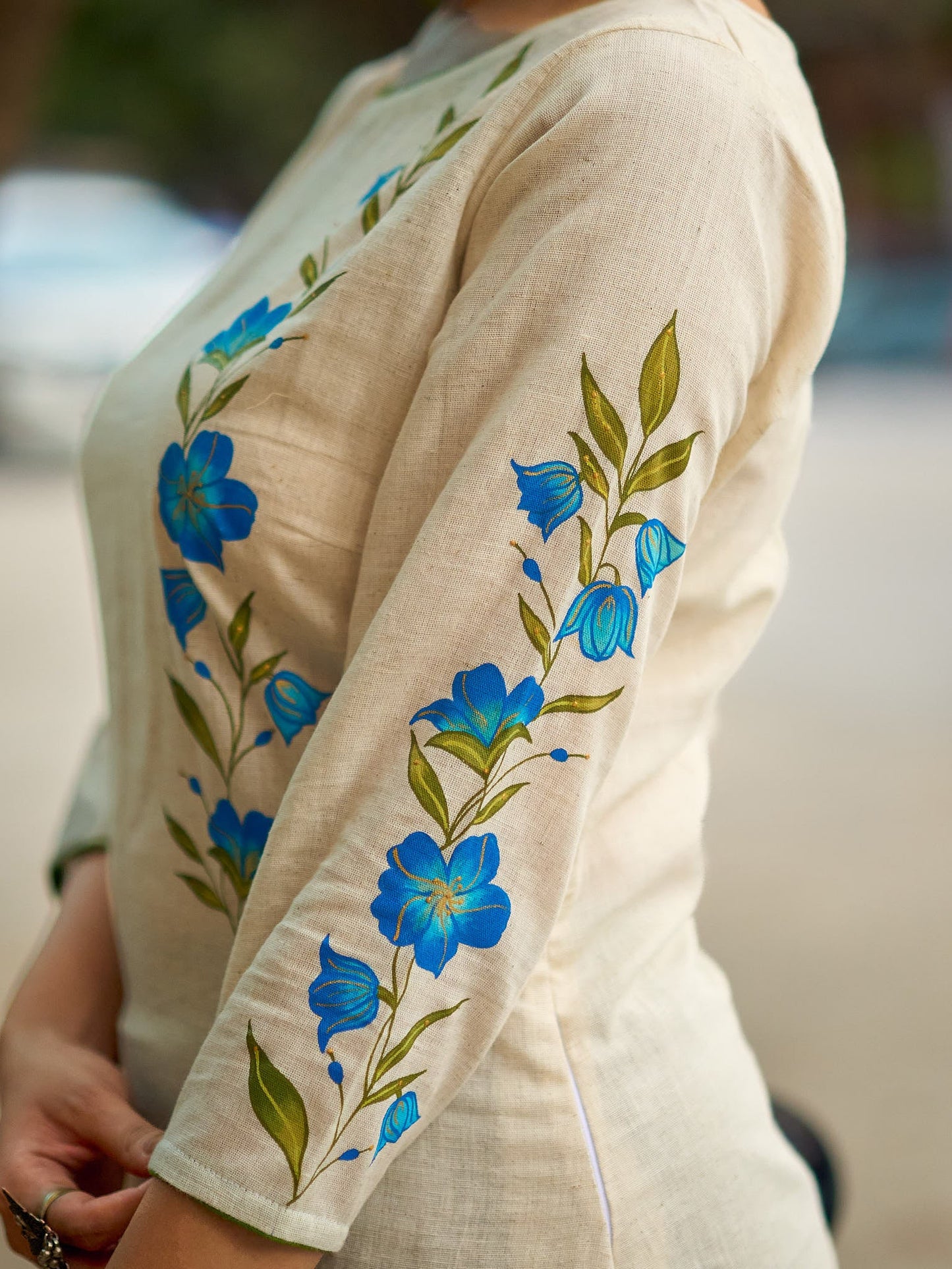 Serene Off-White Cotton Flex Kurta with Artistic Hand Painted Blue Floral Motif & Simple Silhouette