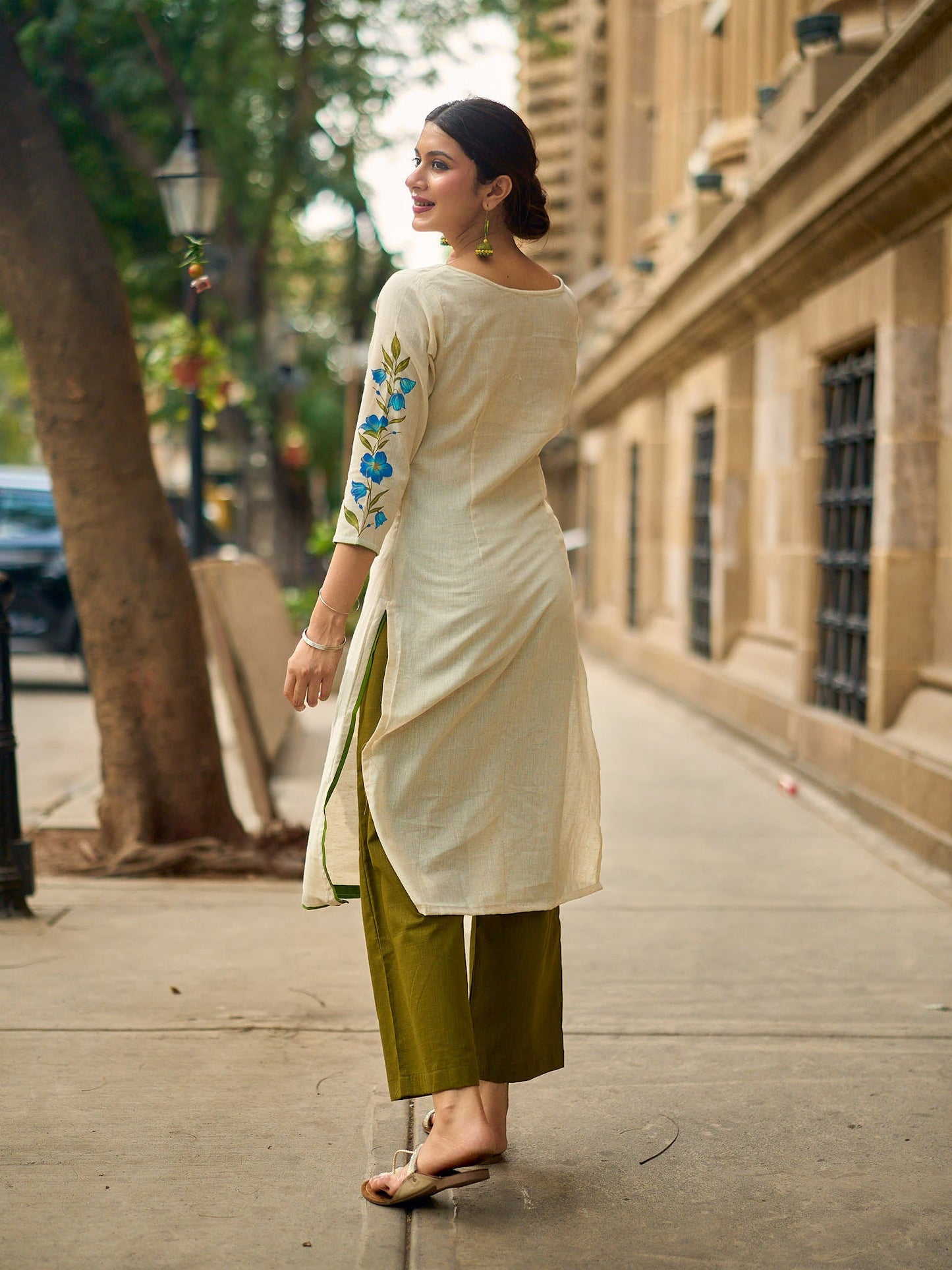 Serene Off-White Cotton Flex Kurta with Artistic Hand Painted Blue Floral Motif & Simple Silhouette