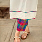 Pristine Off-White Sleeveless Halter Neck Kurta with Vibrant Multicolor Buttons & Hem Trim