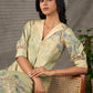 Soft green Kalamkari printed collared dress with centre pleat detailing.