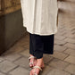 Timeless Off-White Cotton Kurta Featuring Hand Painted Warli Folk Art Yoke & Cuff Band