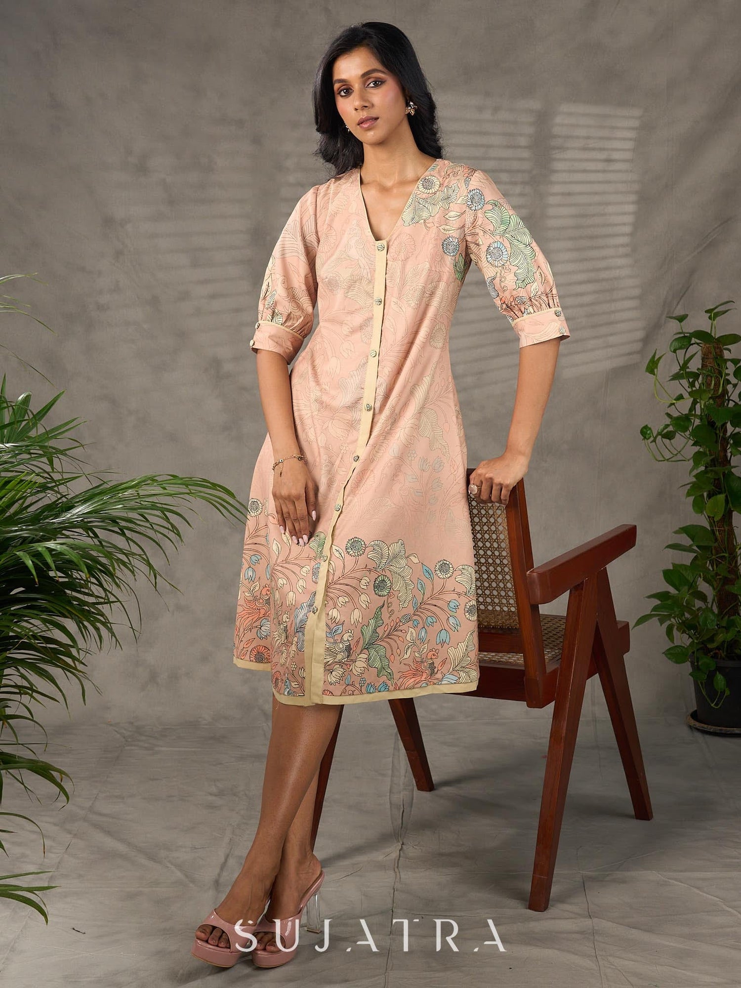 Peach Kalamkari-inspired shirt dress with soft beige accents.
