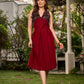 Statement sleeveless Ajrakh dress elevated with a folded collar and graceful maroon pleats.