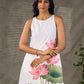 Graceful White lotus printed dress with elegant olive accents.