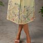 Soft green Kalamkari printed collared dress with centre pleat detailing.