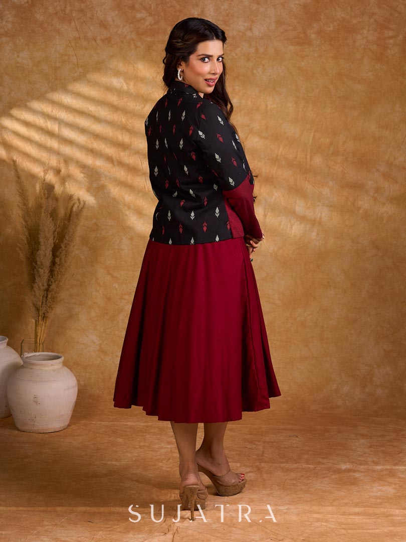 Sharp black and maroon half-and-half Jamdani jacket with functional flap pockets, offering a structured silhouette with bold contrast and refined detailing for elevated corporate styling.