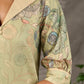 Soft green Kalamkari printed collared dress with centre pleat detailing.