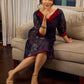 Elegant black Kalamkari-inspired dress with deep maroon accents and graceful floral motifs.