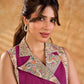 Elegant Madhubani jacket featuring magenta panels, asymmetrical closure, and a notch collar, enhanced with matching accents for a clean, tailored silhouette ideal for elevated corporate wear.