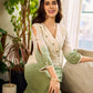 Serene ivory and sage green ombré overlap hakoba dress with olive button accents.