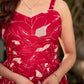 Pretty red dress featuring a sweetheart neckline, pleated waist panel, and soft gathers that create a graceful flow.
