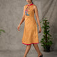 Mustard Gond printed mandarin collar dress with vibrant pink accents.