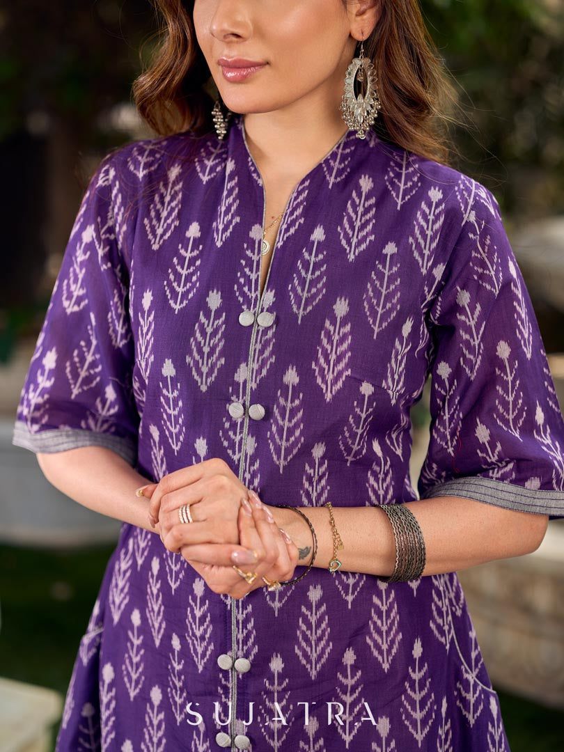 Elegant purple mercerised Ikat dress designed with a softly folded round neckline revealing grey highlights and balanced grey accents throughout