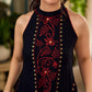 Black bias-cut block print halter dress with a red jaal hand block printed front panel, golden print detailing, and red accents for a striking, elegant statement look.