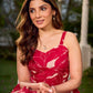 Pretty red dress featuring a sweetheart neckline, pleated waist panel, and soft gathers that create a graceful flow.