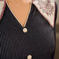 Timeless black stripes accented with exquisite hand-painted Madhubani on collars and cuffs
