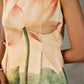 Statement Cream lotus motif dress with earthy olive accents.