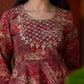 Exquisite deep maroon printed kurta with a graceful bias silhouette, intricate handwork on the yoke, and scalloped sleeve detailing.
