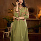 Muted pista hand block printed dress with delicate cascading hand block floral motifs and soft pink accents for a graceful, elegant, and refreshing everyday look.