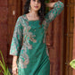 Statement green paisley kurta with detailed hand embroidery beautifully enhancing the print.