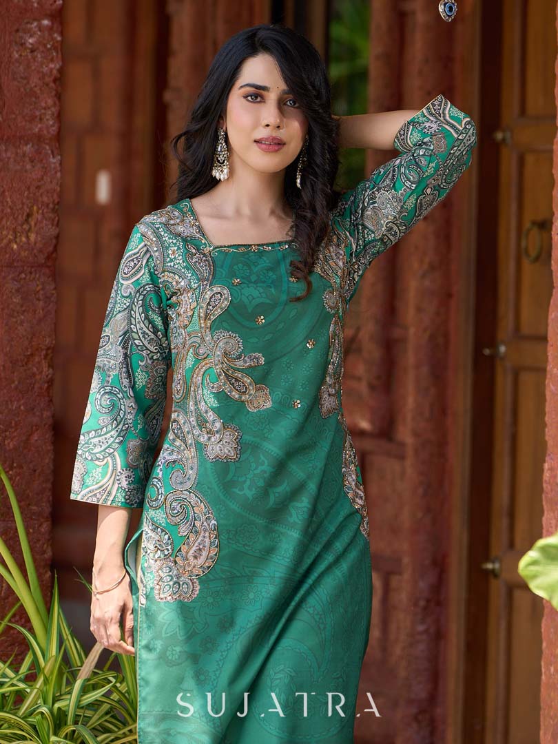 Statement green paisley kurta with detailed hand embroidery beautifully enhancing the print.
