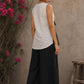 White cotton wrap-style top featuring contrast block print mantra borders, side tie, and modern silhouette.