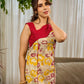 Elegant cream and maroon Madhubani dress featuring sophisticated wavy pintuck flap detailing.