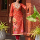 Elegant orange floral printed kurta with hand-embroidered sequin and cut dana detailing on the yoke and rich maroon accents.