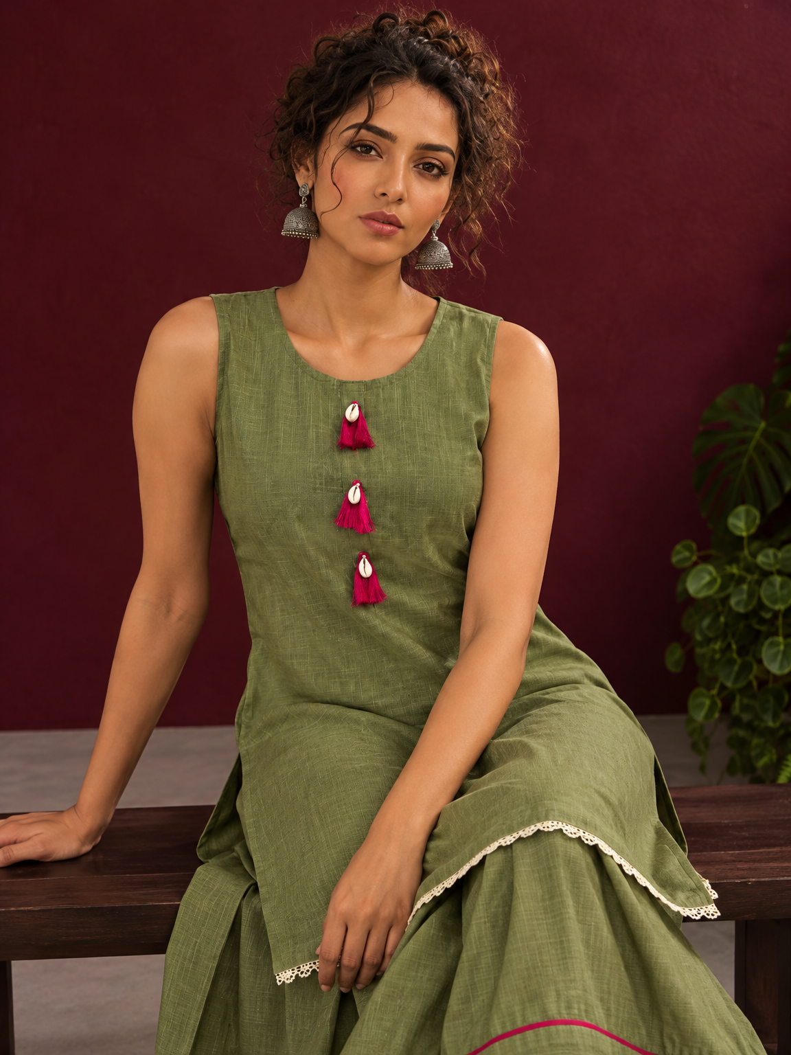 Sage Green Cotton Co-Ord Set with Pink Tassel Shell Buttons and Lace Trim Farshi Salwar — seated detail