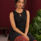 Black Sleeveless Keyhole Neck Tunic Co-Ord Set with Maroon Ajrakh Printed Cotton Farshi Salwar — seated detail