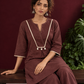 Brown Cotton Co-Ord Set with Contrast Cream Kantha Neckline & Cowrie Shell Tassels with Straight Fit Pant — seated detail