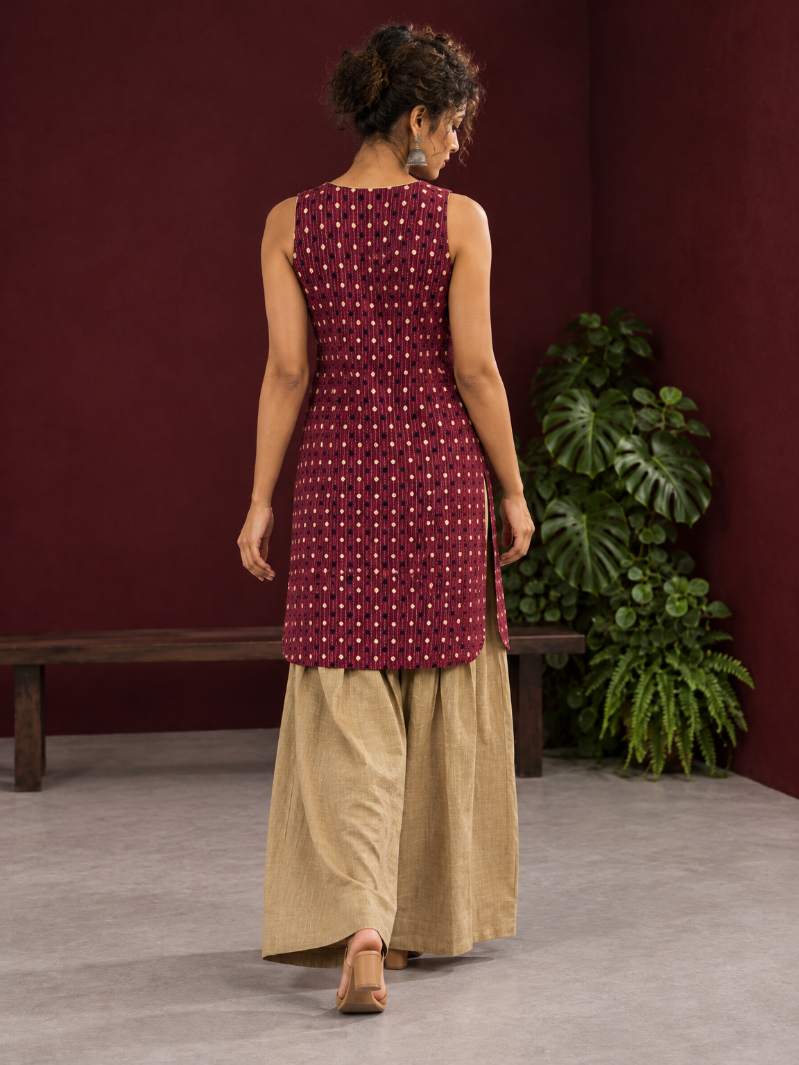 Maroon Printed Cotton Sleeveless Co-Ord Set with Polka Dot Motifs and Pleated Beige Farshi Salwar — back view