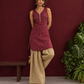 Maroon Printed Cotton Sleeveless Co-Ord Set with Polka Dot Motifs and Pleated Beige Farshi Salwar — side view