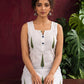 White Cotton Sleeveless Printed Tunic Co-ord Set with Navy Blue Cotton Farshi Salwar — seated detail