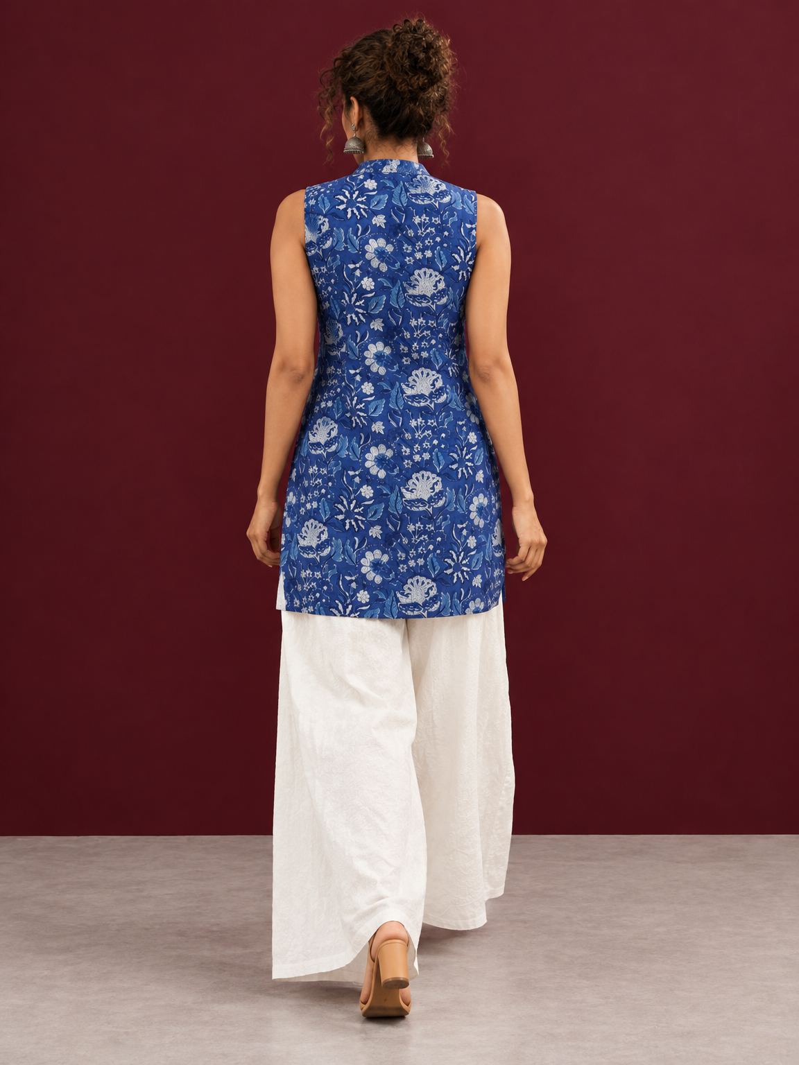 Blue Cotton Sleeveless Floral Printed Tunic Co-ord Set with White Cotton Farshi Salwar — in motion
