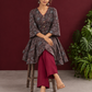 Black Ajrakh Print Cotton Tunic Co-ord Set with Maroon Cotton Straight Pant — seated