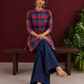 Madras checks Cotton Co ord with Mandarin Collar and Contrast Navy Button Placket and navy blue Farshi Salwar — seated