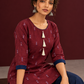 Classic Maroon Cotton Co ord with Navy Blue Contrast Trim and Triangle Print with Tassel Detailing with navy — seated detail