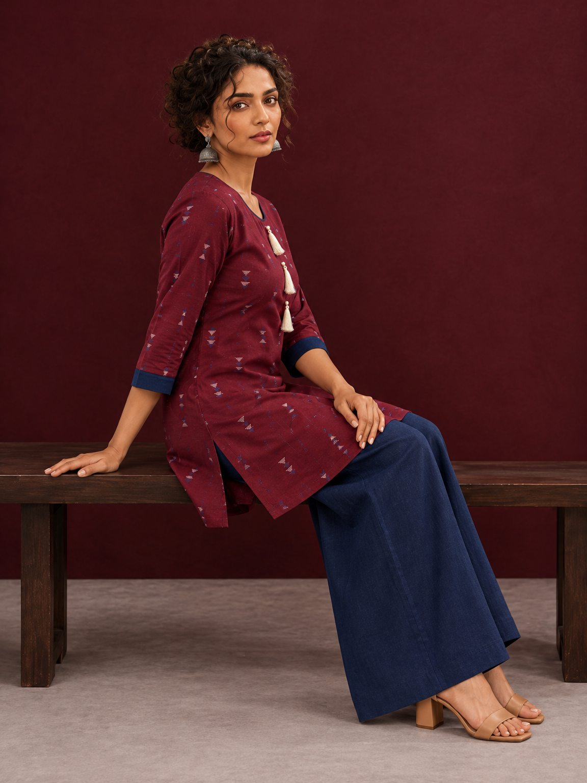 Classic Maroon Cotton Co ord with Navy Blue Contrast Trim and Triangle Print with Tassel Detailing with navy blue Fa — seated
