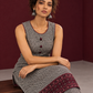 Classic Beige & Black Ajrakh Print Co-Ord Set with Maroon Floral Border Detail — seated detail