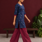 Navy Blue Cotton Co-Ord Set with Maroon Contrast Cuffs and Scoop Neckline Piping and maroon Farshi pants — in motion