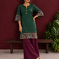 Bottle Green Ikat Cotton Co-Ord Set with Kalamkari Peacock Print Border on Sleeves and Hem with Maroon Farshi Col — side view
