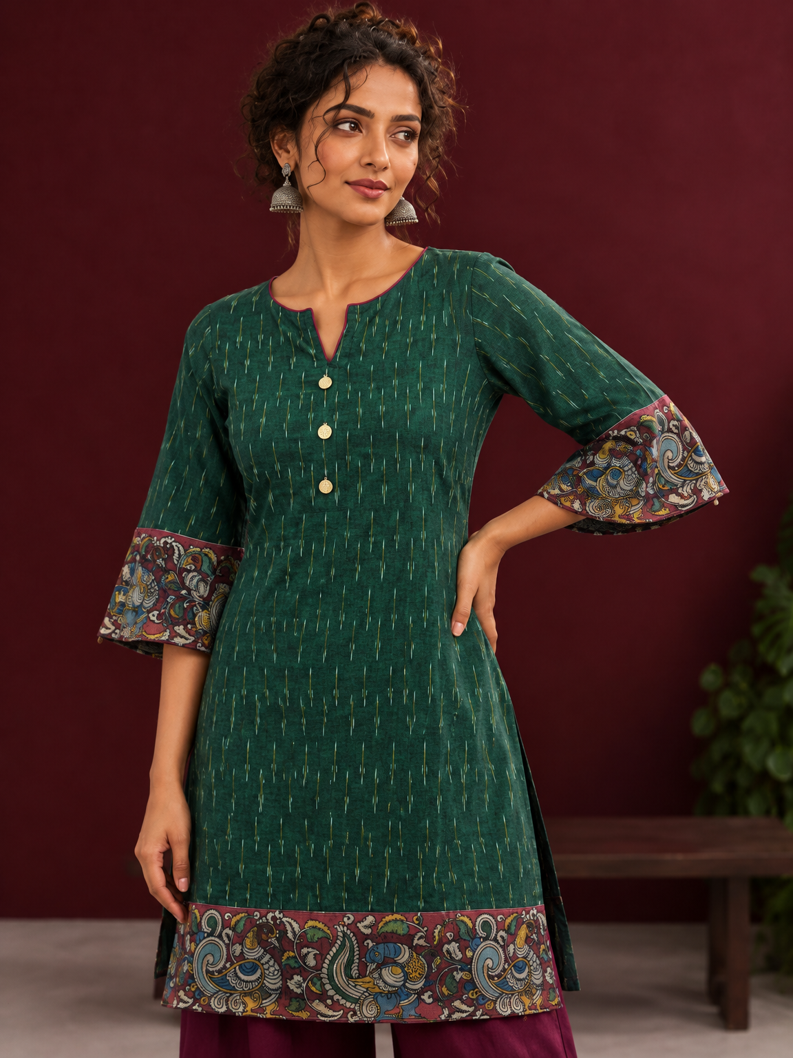 Bottle Green Ikat Cotton Co-Ord Set with Kalamkari Peacock Print Border on Sleeves and Hem with Maroon Farshi — fabric detail