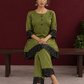 Elegant Olive Green Cotton Co-Ord Set with Contrast Black Floral Lace Hem and Cuffs with Straight olive pants and bl — seated