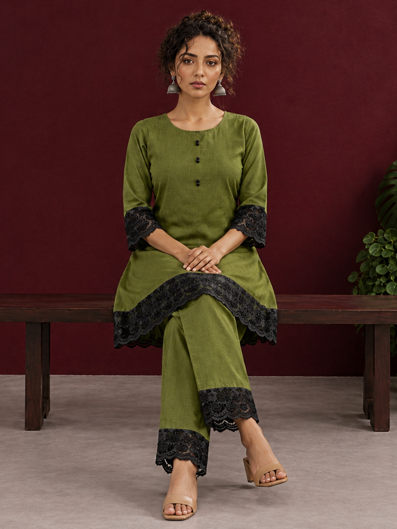 Elegant Olive Green Cotton Co-Ord Set with Contrast Black Floral Lace Hem and Cuffs with Straight olive pants and bl — seated